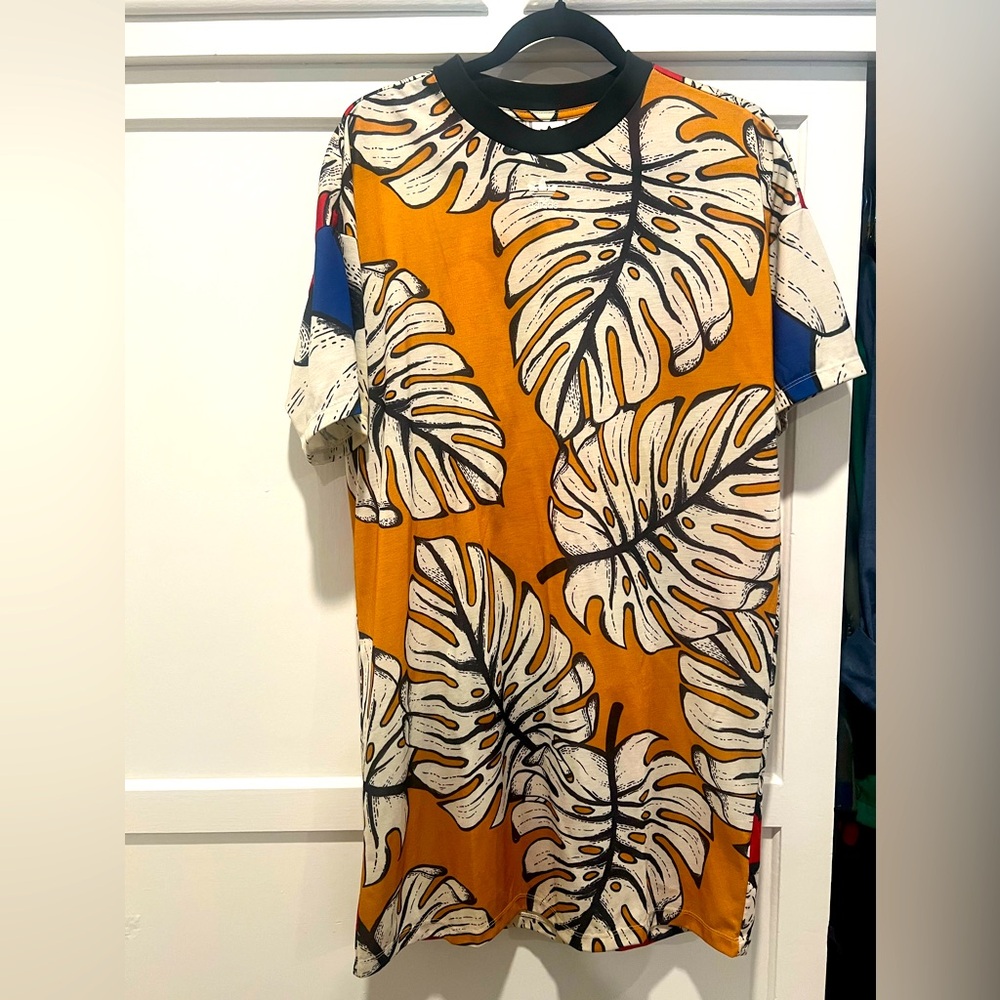 Limited edition Adidas t-shirt dress. Size medium.